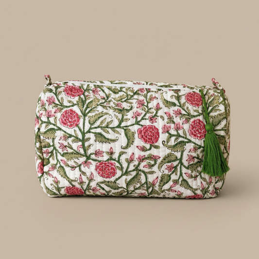 Grote toilettas met botanische print van groene bladeren en roze bloemen