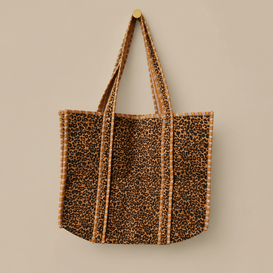 Gewatteerde tote bag met bruine luipaardprint en gestreepte hengsels