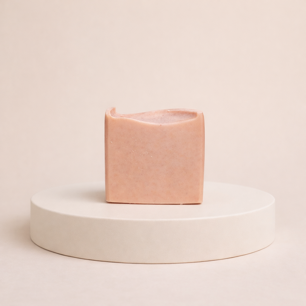 NU-MI roze reinigingsbar voor gevoelige huid op een minimalistische ronde display.